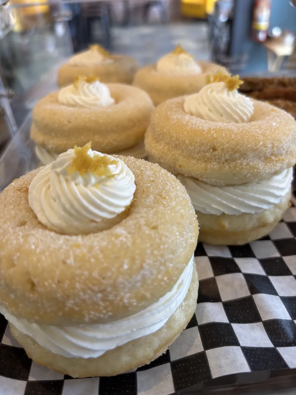 Sugared doughnuts filled with cream