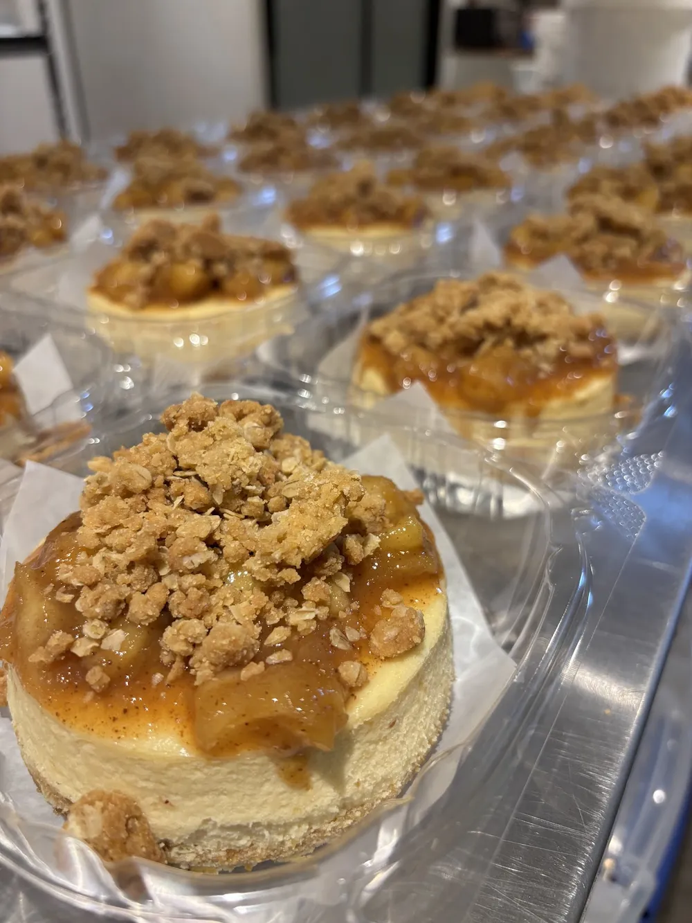 Cheesecake cups with caramel and crumble on top